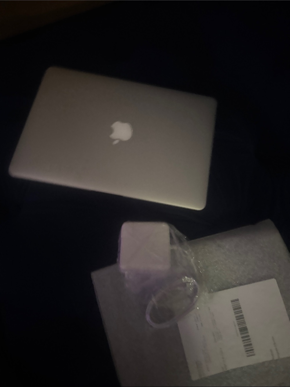 Apple Silver MacBook with White Charger